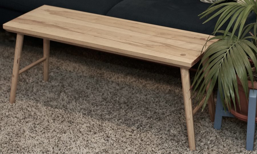 Simple bench in natural wood